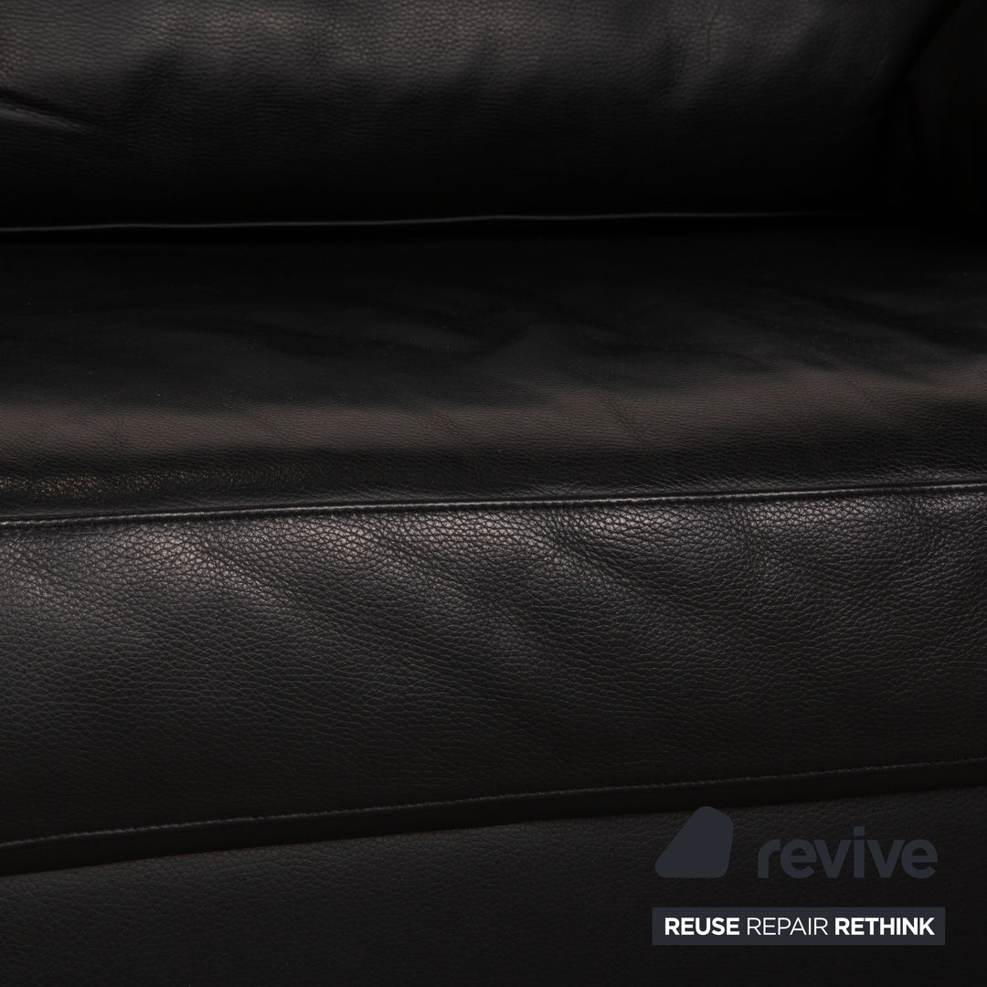Bielefelder Werkstätten leather three-seater black sofa couch function