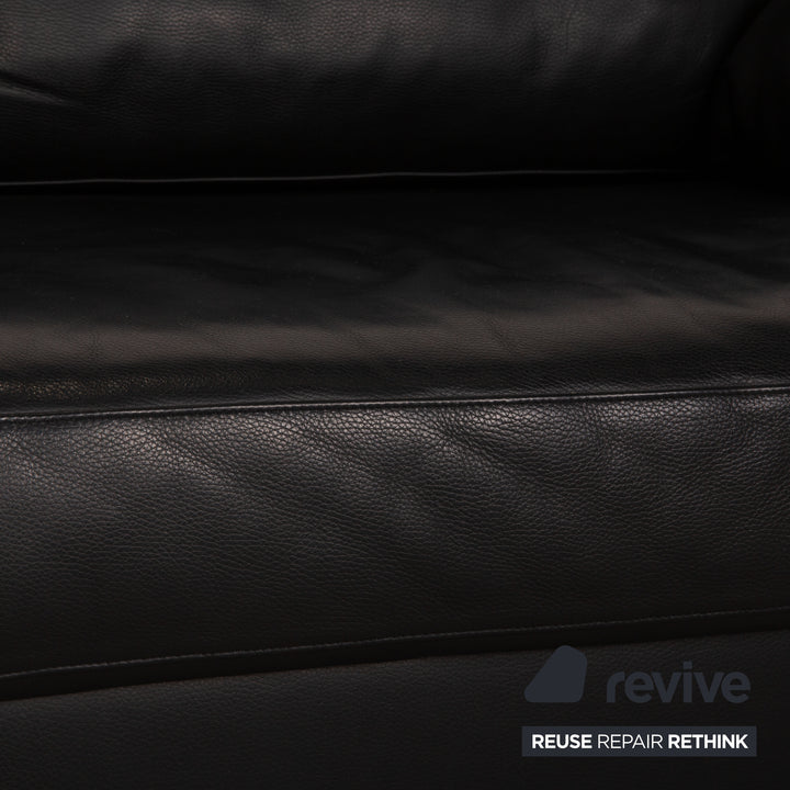 Bielefelder Werkstätten leather three-seater black sofa couch function
