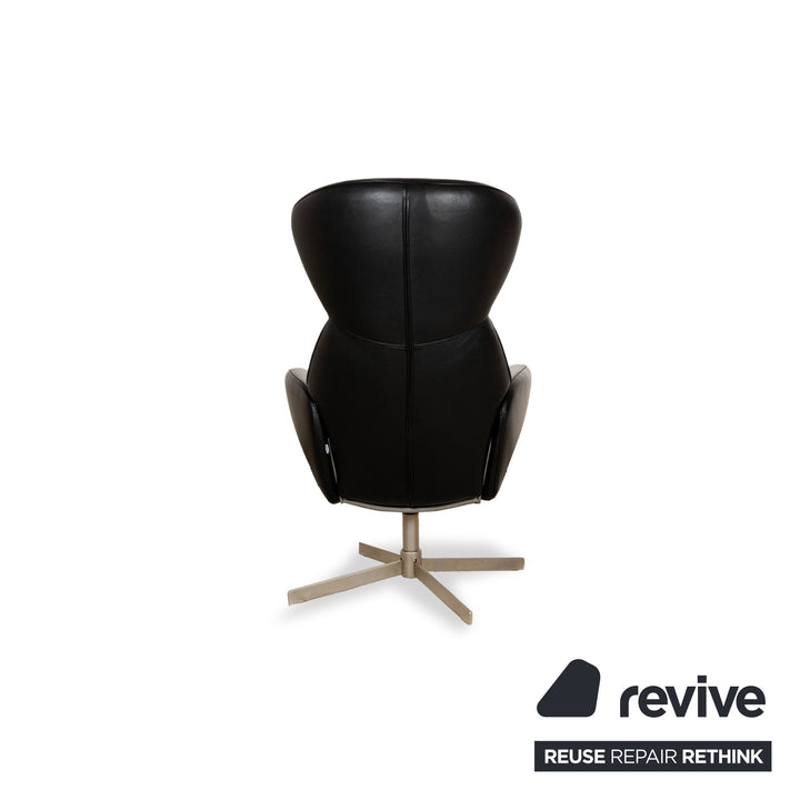 BoConcept Athena Relax Fauteuil en cuir Noir avec tabouret fonction manuelle