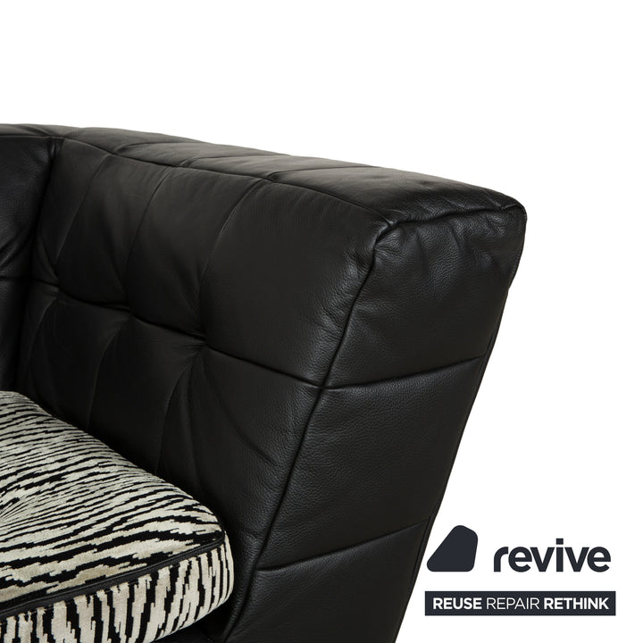 Fauteuil pivotant en cuir et tissu noir Bretz Tiziana