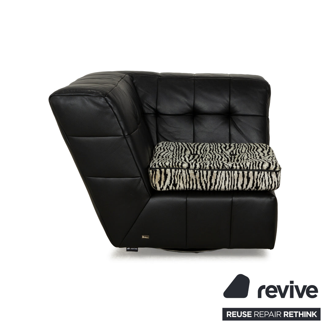Fauteuil pivotant en cuir et tissu noir Bretz Tiziana