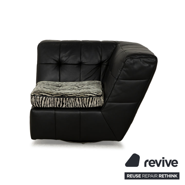 Fauteuil pivotant en cuir et tissu noir Bretz Tiziana