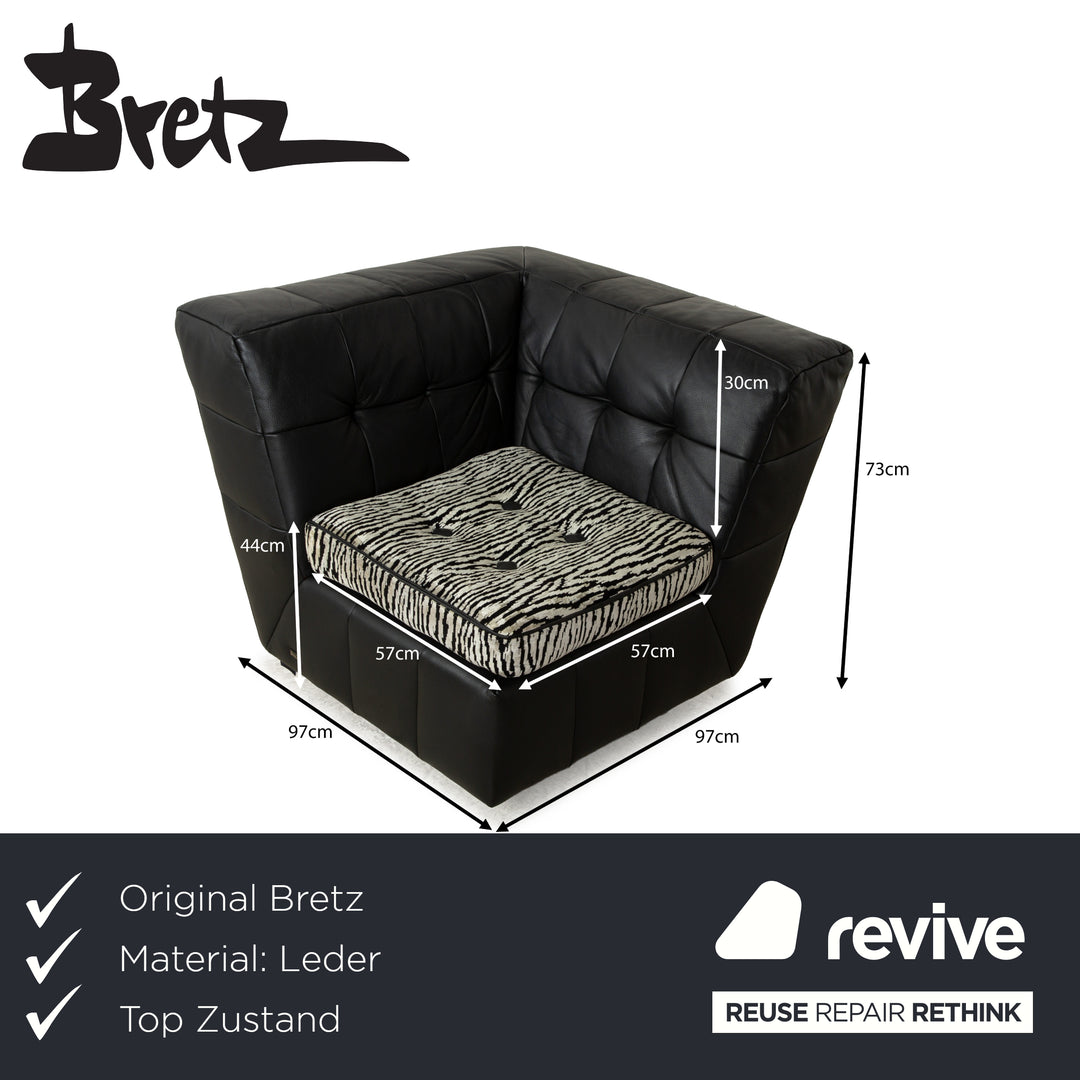 Fauteuil pivotant en cuir et tissu noir Bretz Tiziana