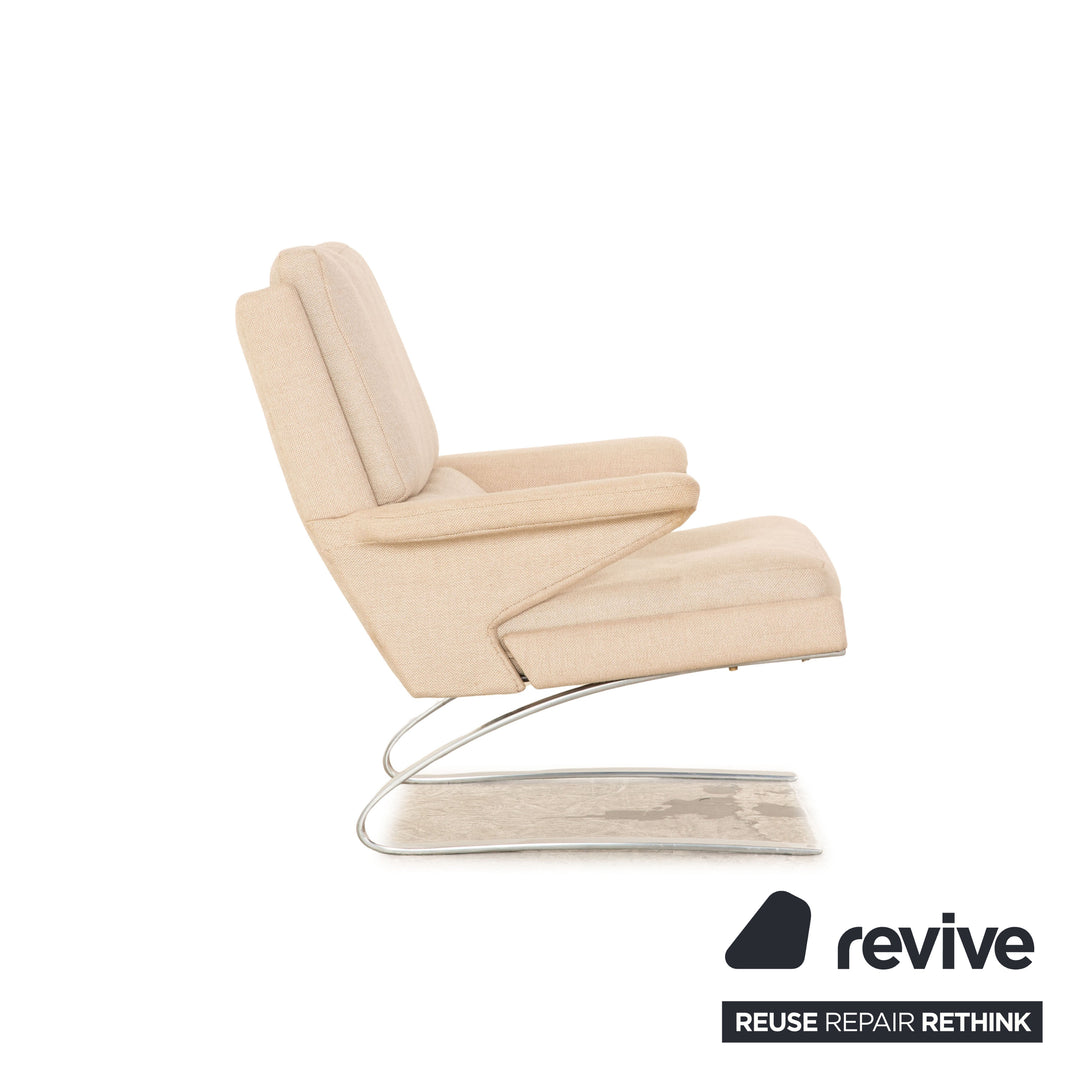 Fauteuil Cor Swing en tissu crème