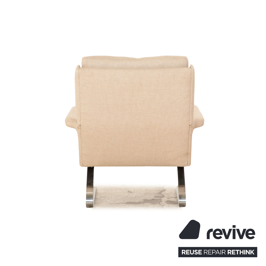 Fauteuil Cor Swing en tissu crème