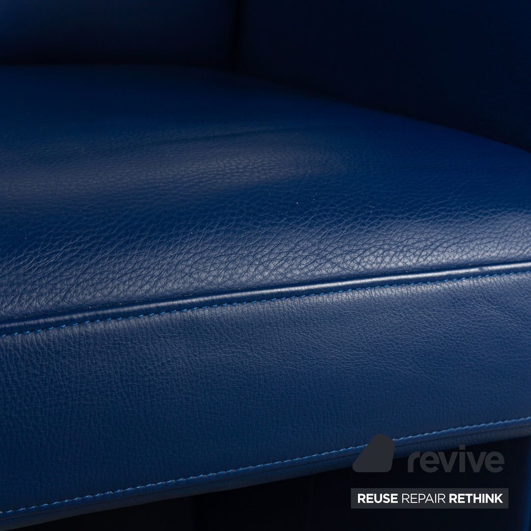 Ensemble de 4 fauteuils en cuir Rolf Benz avec roulettes bleues