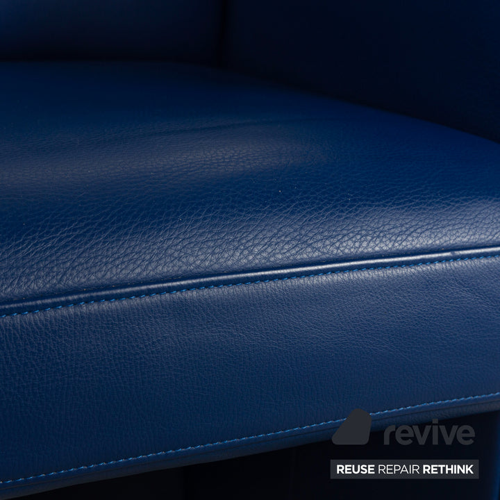 Ensemble de 4 fauteuils en cuir Rolf Benz avec roulettes bleues