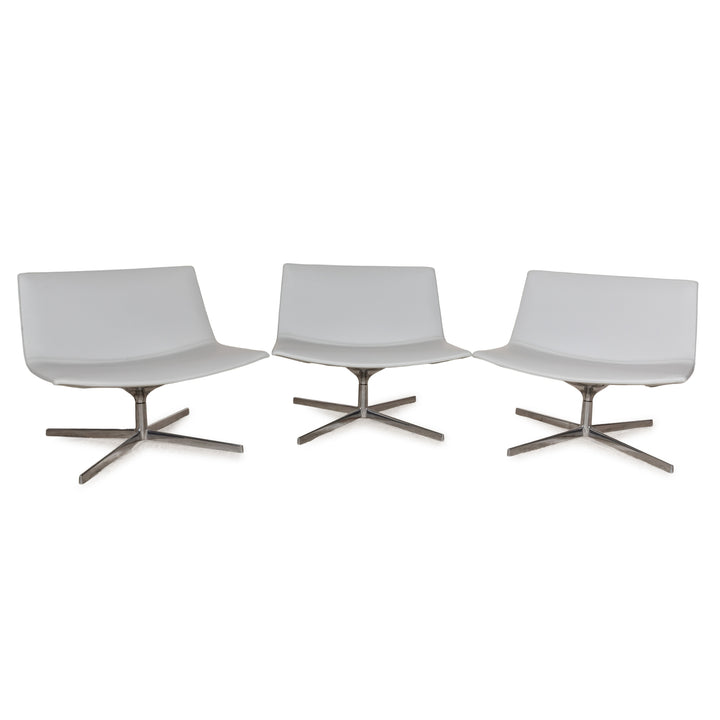 Ensemble de fauteuils pivotants en cuir Arper Catifa 80 bleu-gris bleu clair