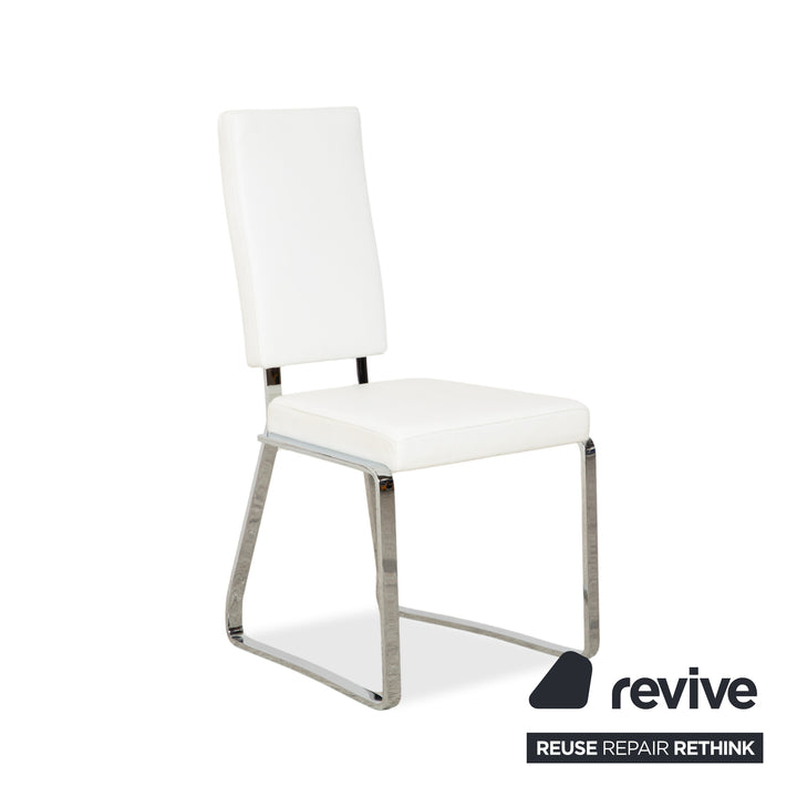 Ensemble de salle à manger Bacher en verre et cuir, comprenant une table et 8 chaises, finitions argent chromé, blanc et crème.