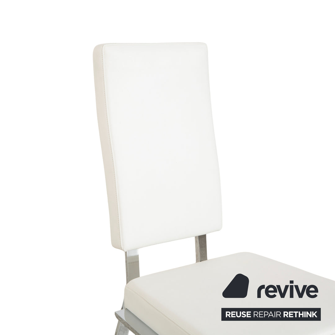 Ensemble de salle à manger Bacher en verre et cuir, comprenant une table et 8 chaises, finitions argent chromé, blanc et crème.