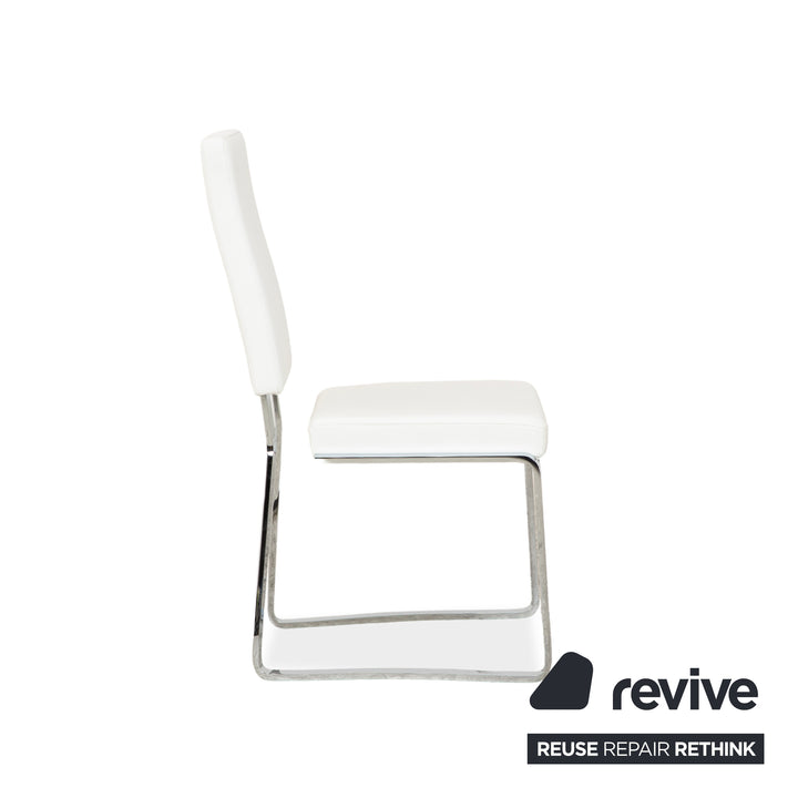 Ensemble de salle à manger Bacher en verre et cuir, comprenant une table et 8 chaises, finitions argent chromé, blanc et crème.