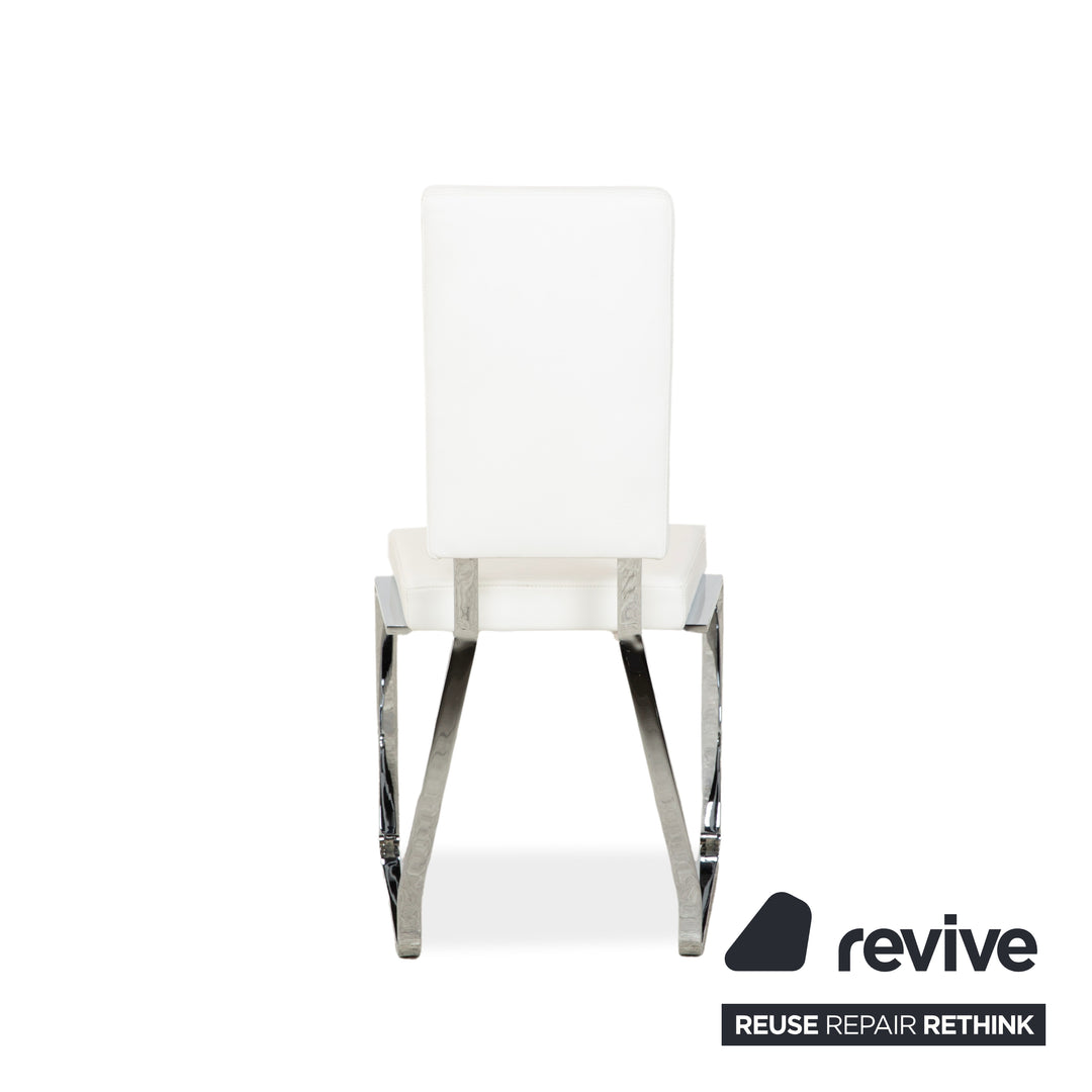 Ensemble de salle à manger Bacher en verre et cuir, comprenant une table et 8 chaises, finitions argent chromé, blanc et crème.