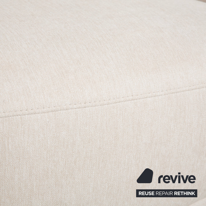 Fauteuil et repose-pieds en tissu BoConcept Bolzano, beige crème