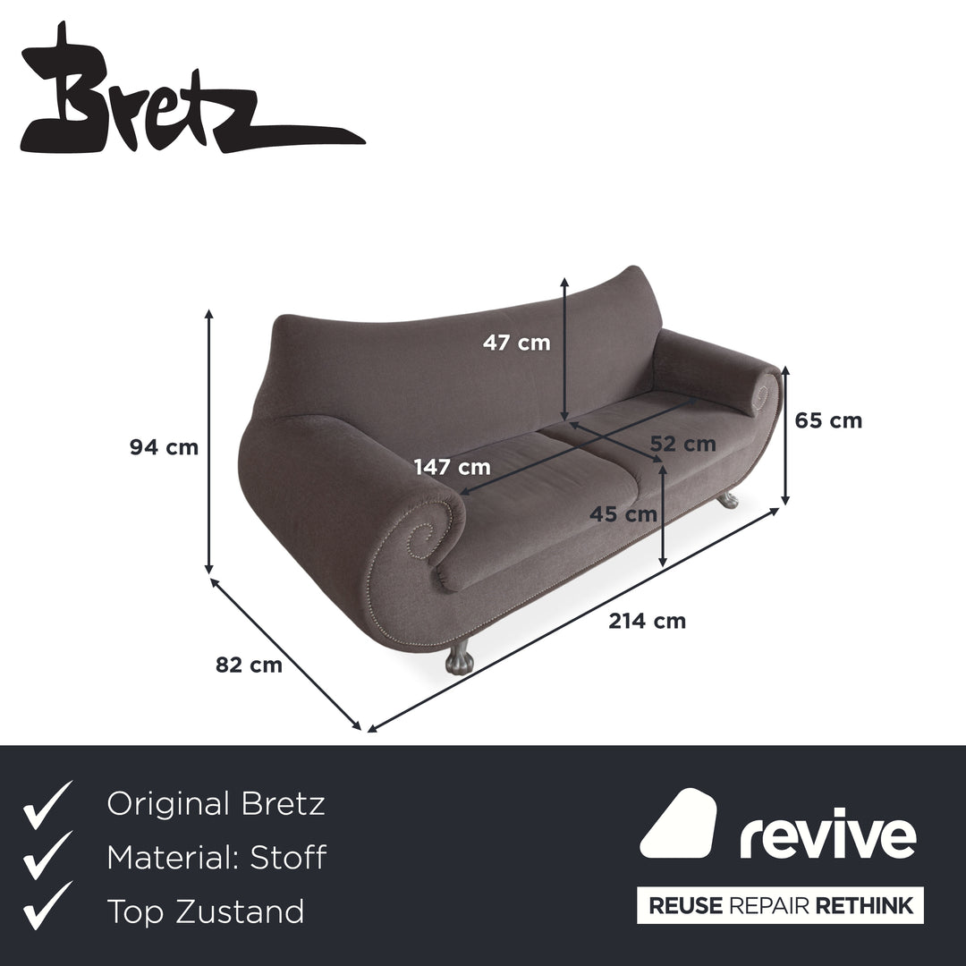 Canapé trois places Bretz Gaudi beige gris marron avec pieds en forme de patte de lion argentés