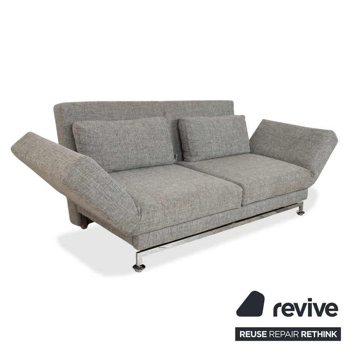 Canapé deux places en tissu gris Brühl Moule, avec fonction couchage.