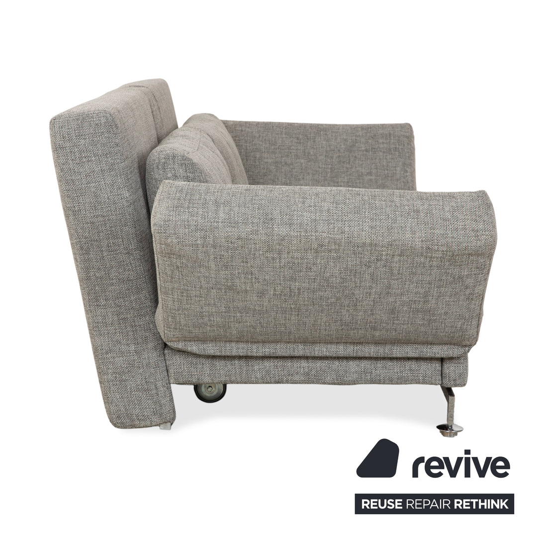 Canapé deux places en tissu gris Brühl Moule, avec fonction couchage.