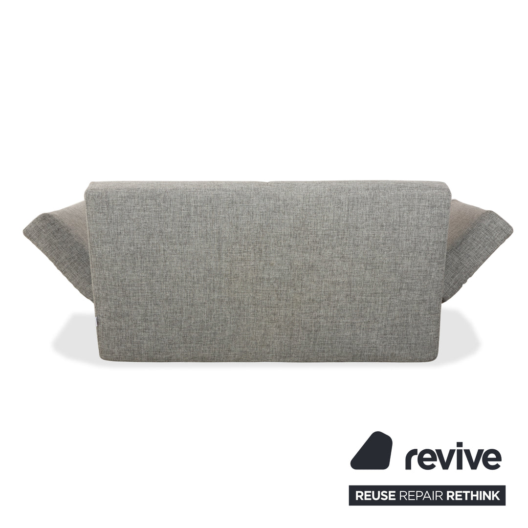 Canapé deux places en tissu gris Brühl Moule, avec fonction couchage.