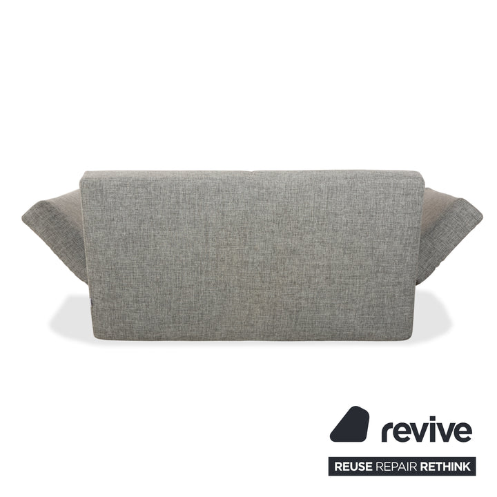 Canapé deux places en tissu gris Brühl Moule, avec fonction couchage.