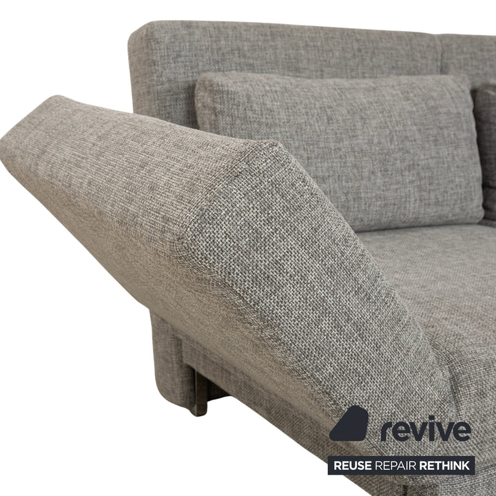 Canapé deux places en tissu gris Brühl Moule, avec fonction couchage.