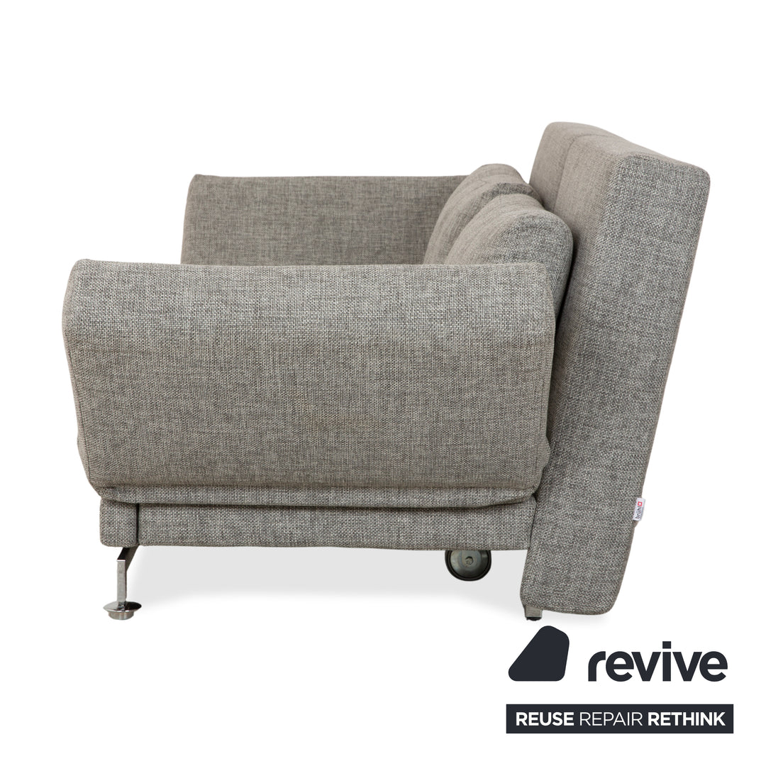 Canapé deux places en tissu gris Brühl Moule, avec fonction couchage.