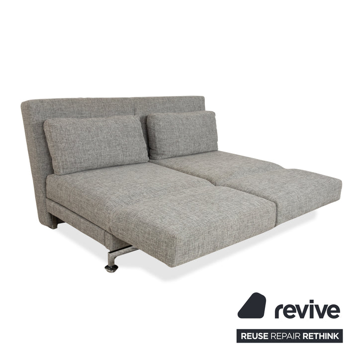 Canapé deux places en tissu gris Brühl Moule, avec fonction couchage.