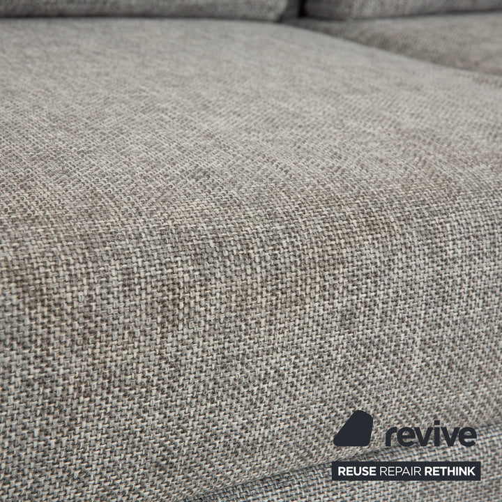 Canapé deux places en tissu gris Brühl Moule, avec fonction couchage.