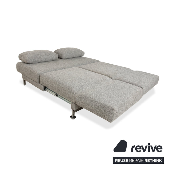 Canapé deux places en tissu gris Brühl Moule, avec fonction couchage.