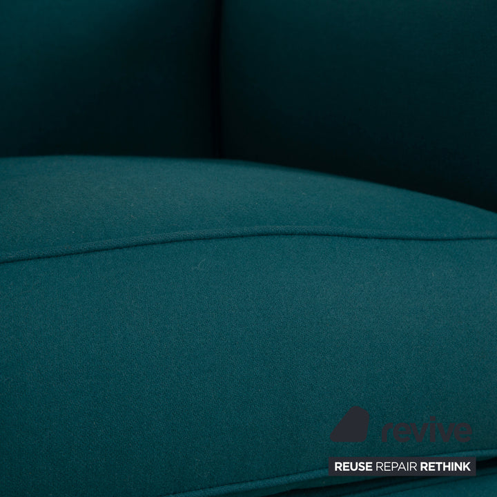 Fauteuil Cassina Le Corbusier LC 2 en tissu bleu pétrole Bauhaus