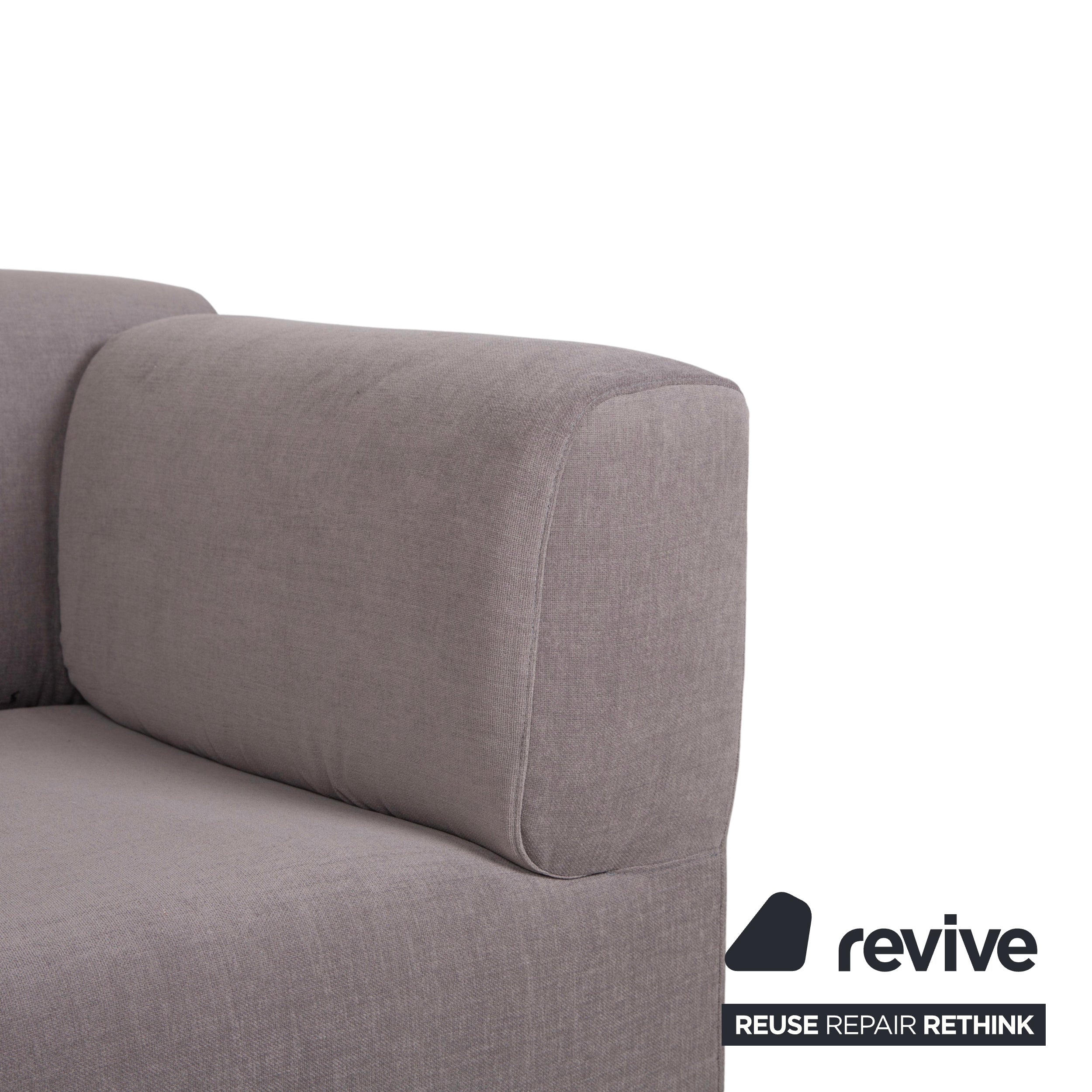 Réfection du canapé trois places en tissu gris taupe Cassina Met 250