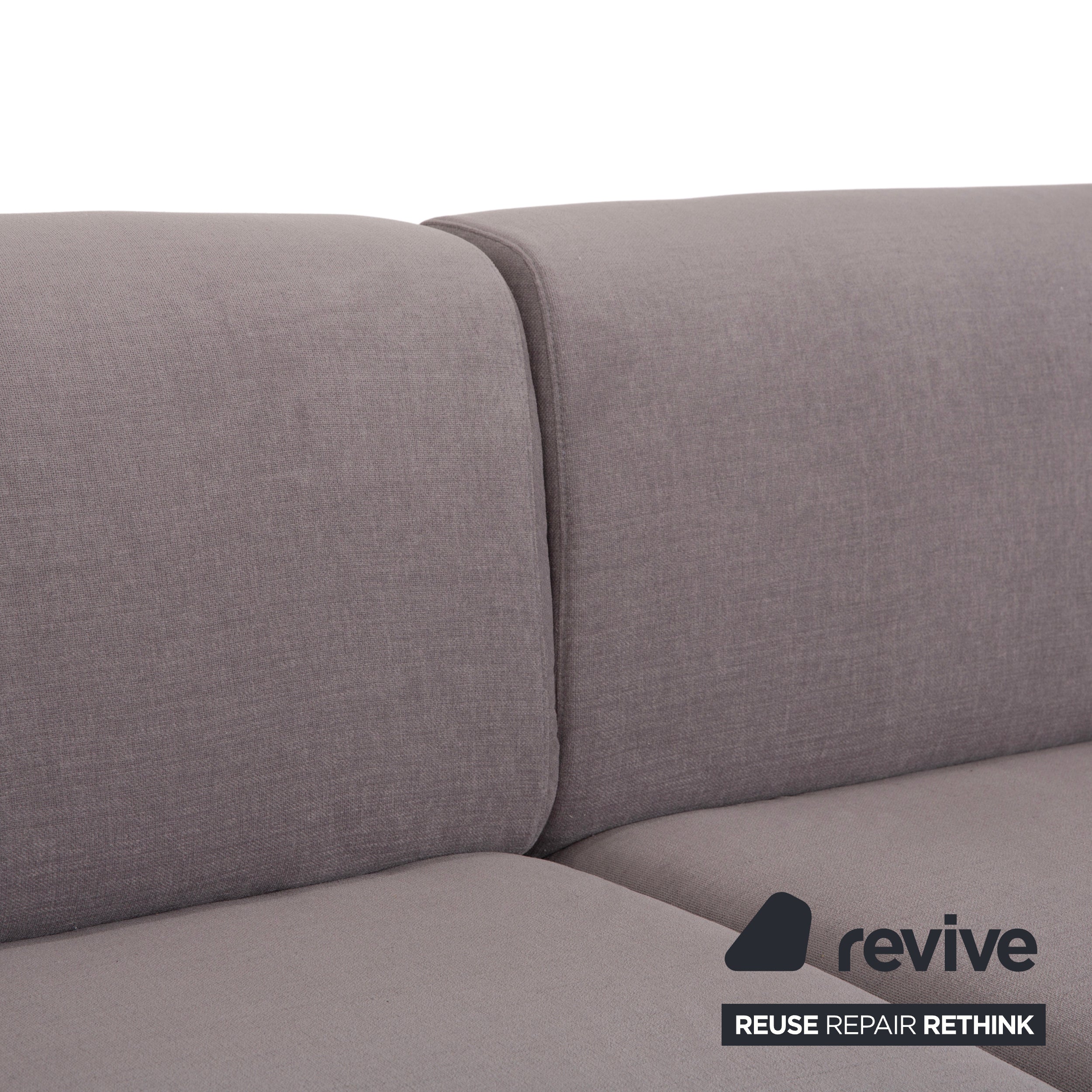 Réfection du canapé trois places en tissu gris taupe Cassina Met 250