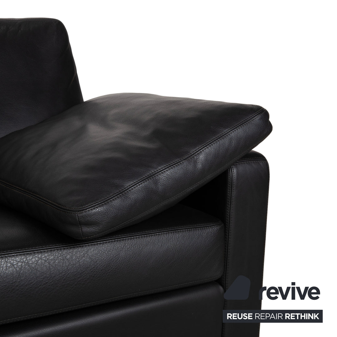 Canapé trois places en cuir noir COR Conseta avec appui-tête et réglage manuel