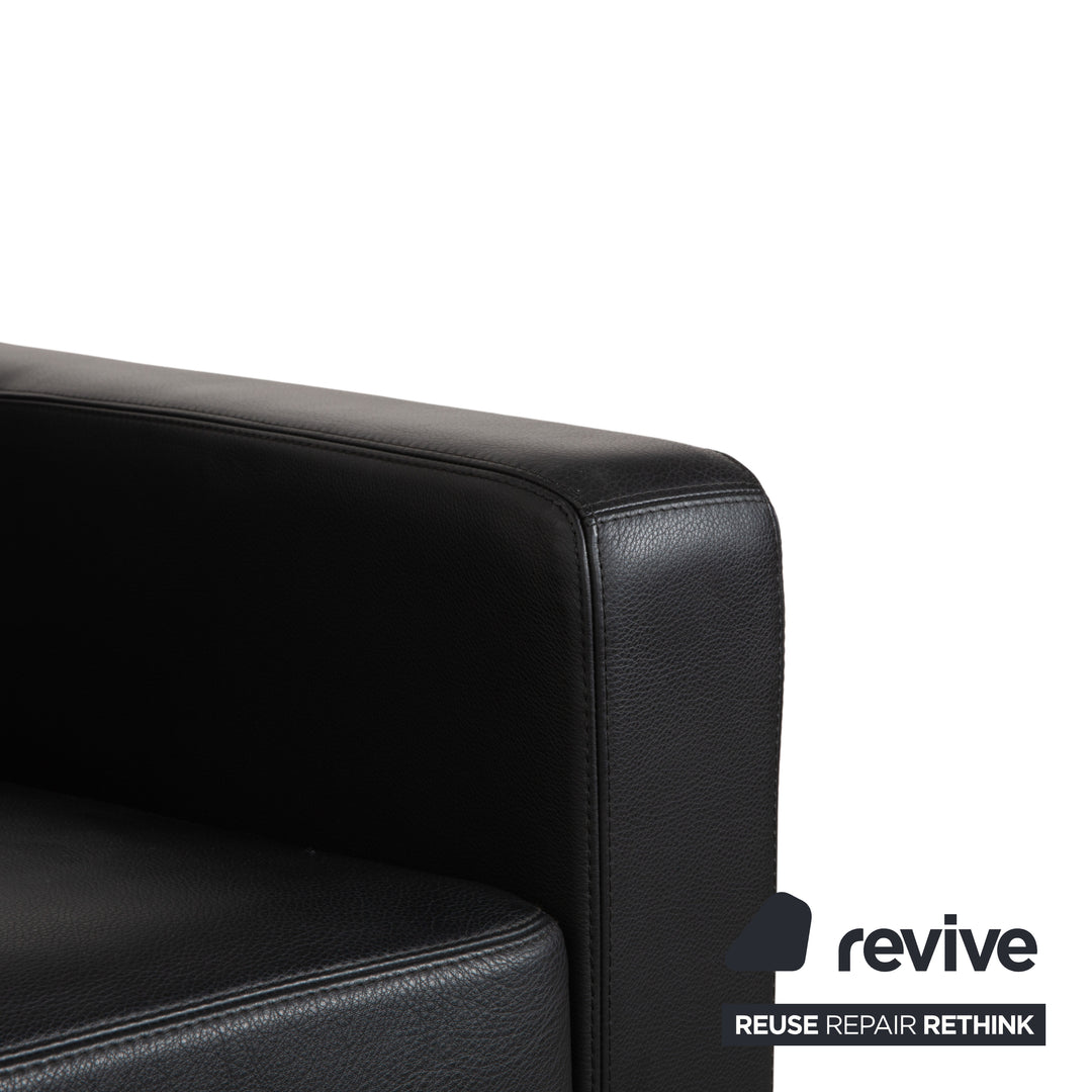 Fauteuil en cuir noir Cor Conseta