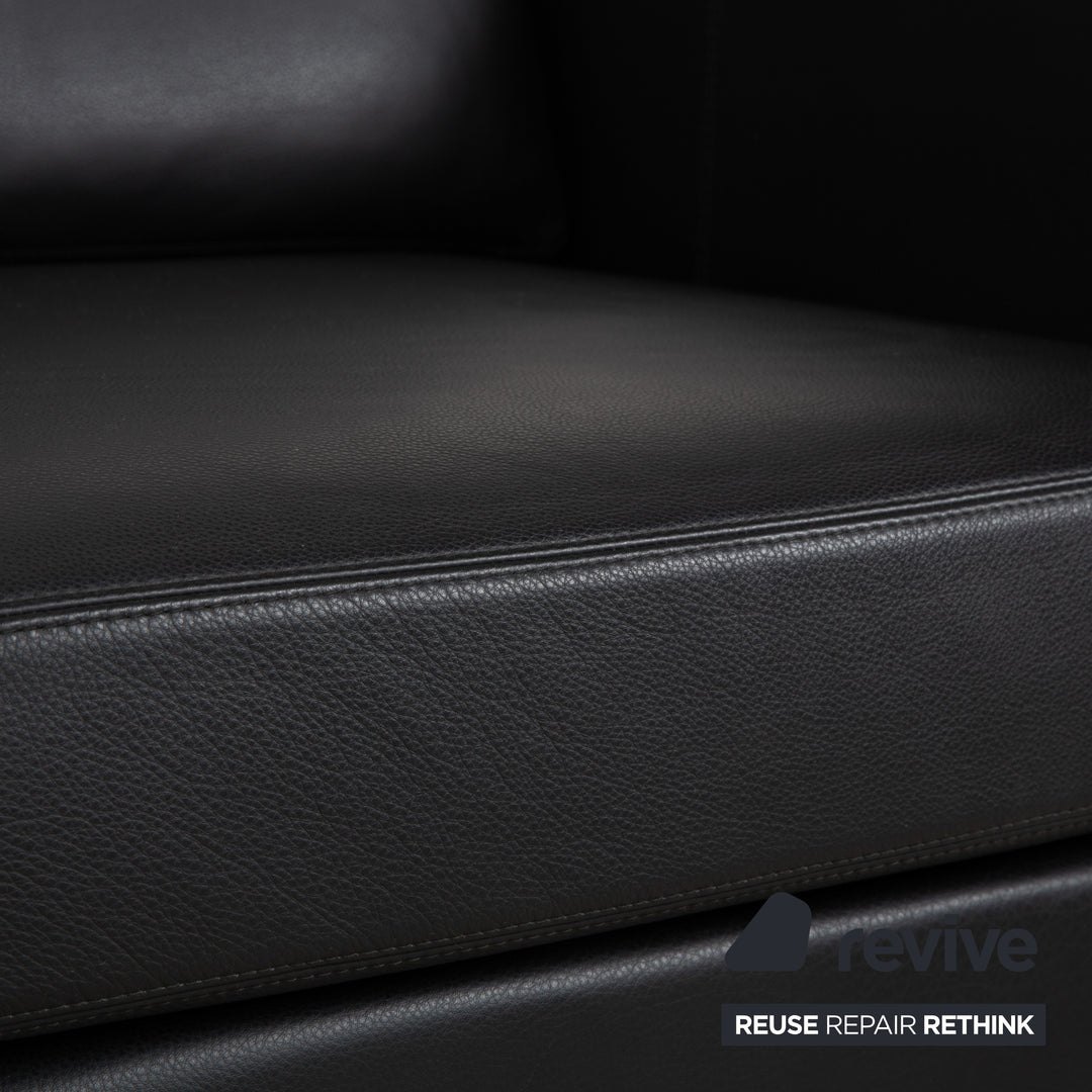 Fauteuil en cuir noir Cor Conseta