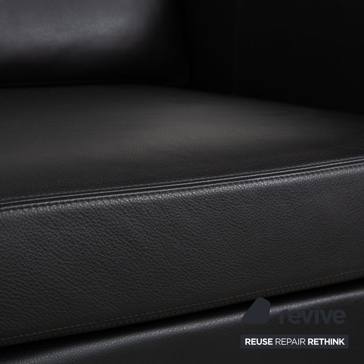 Fauteuil en cuir noir Cor Conseta