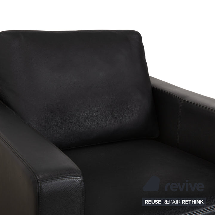 Fauteuil en cuir noir Cor Conseta