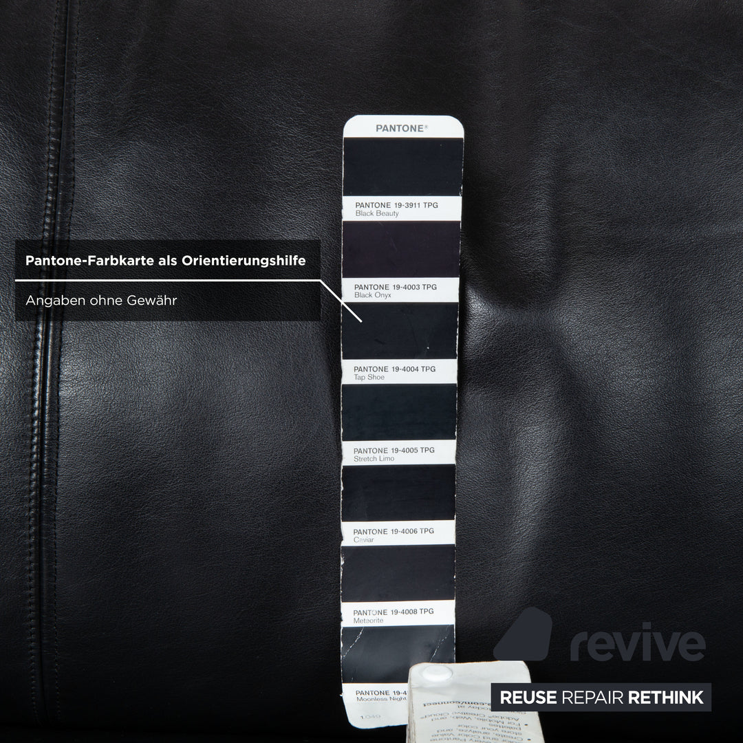 Canapé quatre places en cuir noir Cor Conseta