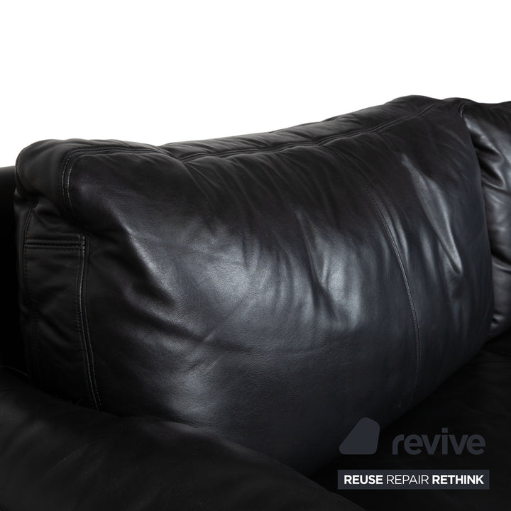 Canapé quatre places en cuir noir Cor Conseta