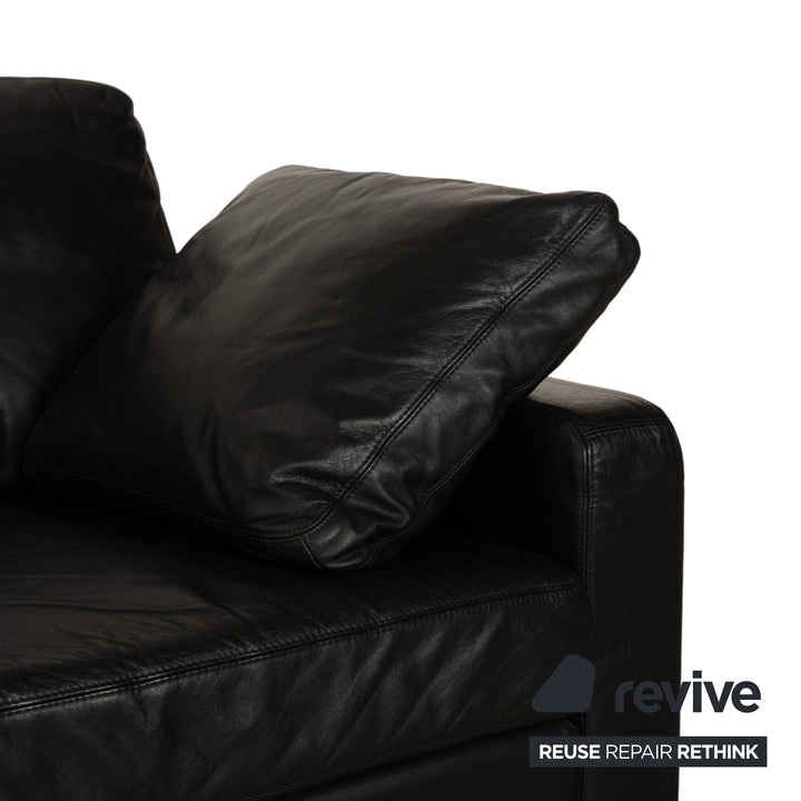 Canapé deux places en cuir noir Cor Conseta