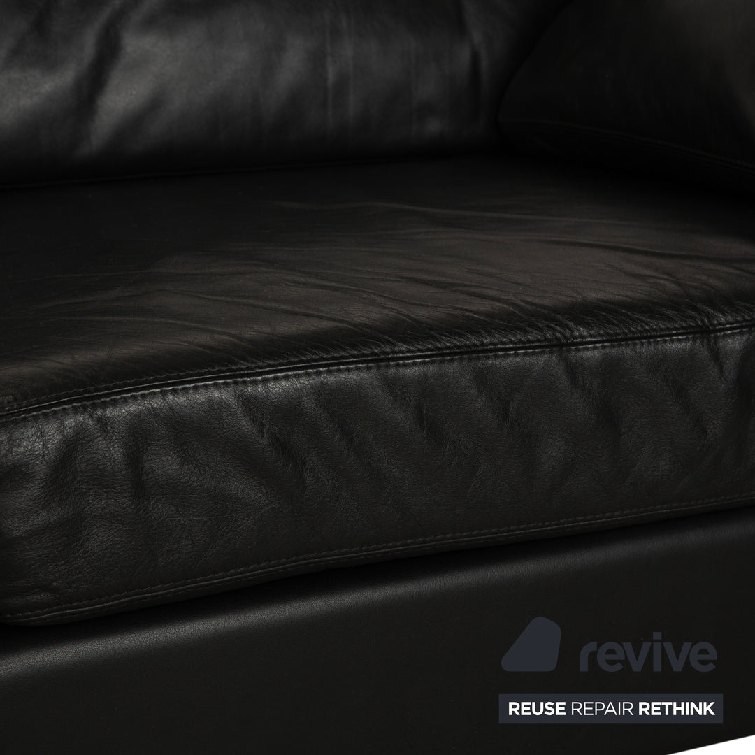 Canapé deux places en cuir noir Cor Conseta