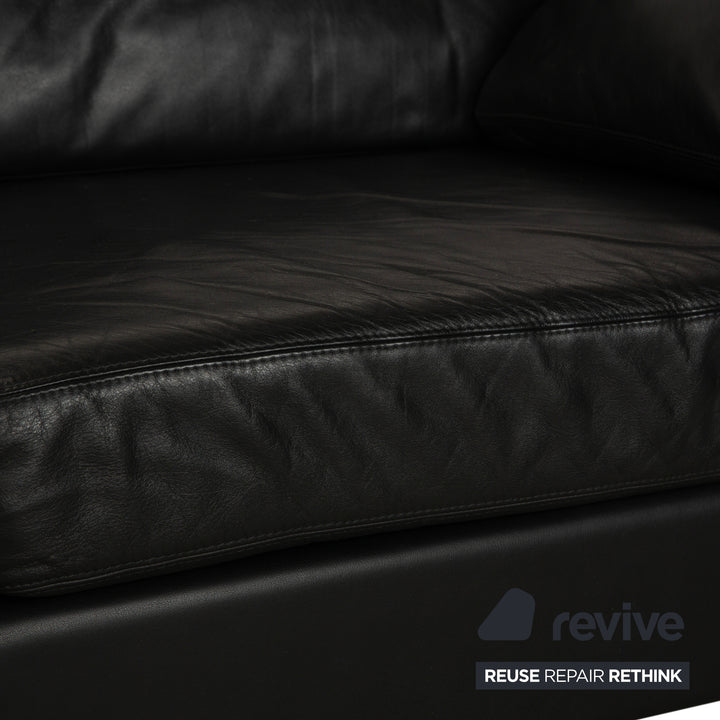 Canapé deux places en cuir noir Cor Conseta