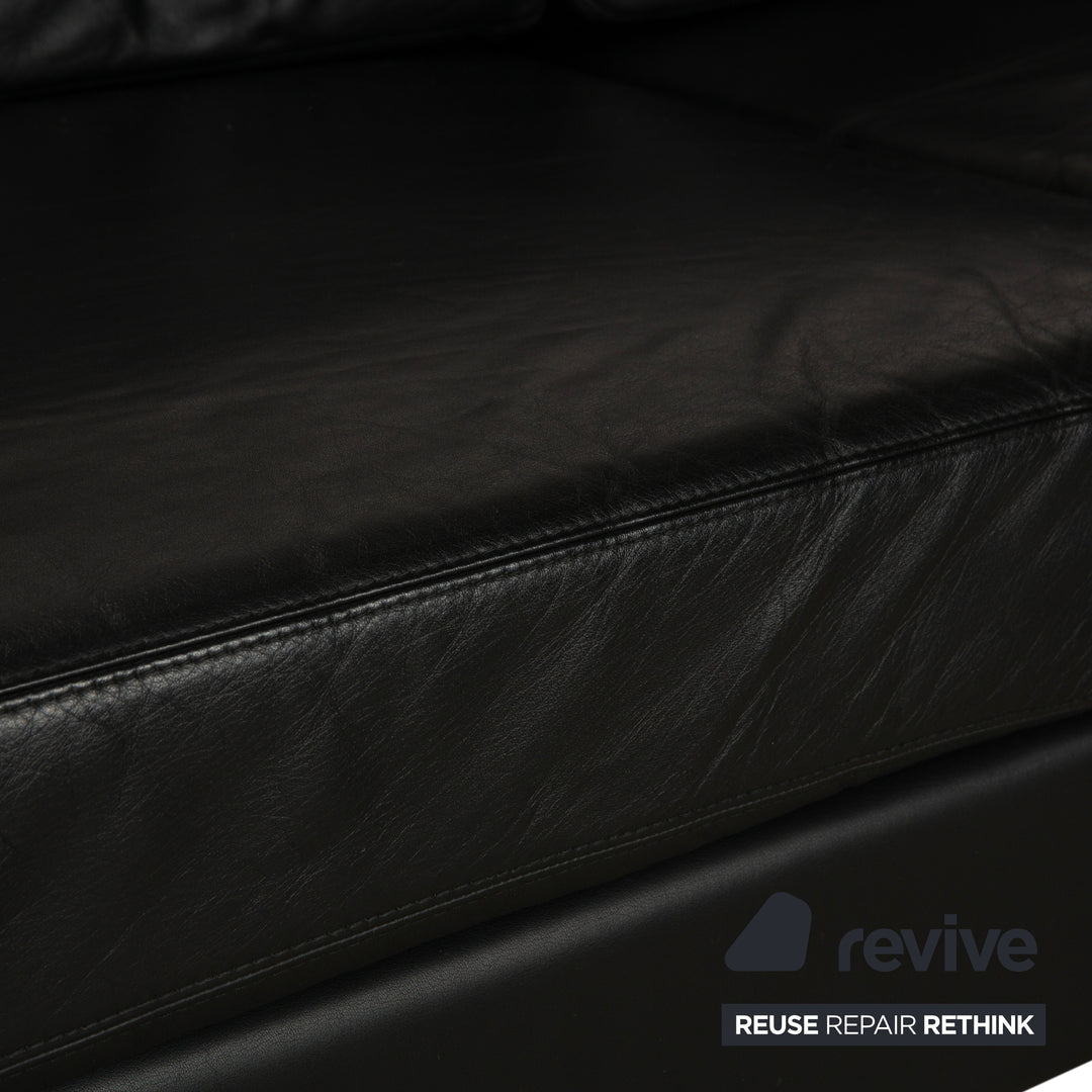 Canapé deux places en cuir noir Cor Conseta