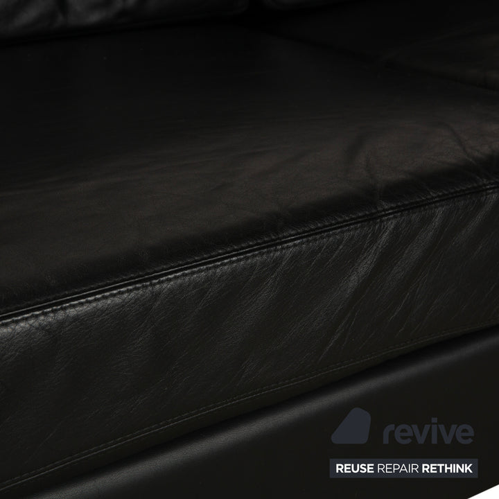 Canapé deux places en cuir noir Cor Conseta