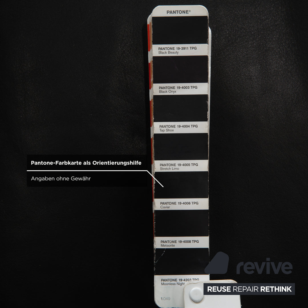 Canapé deux places en cuir noir Cor Conseta avec appui-tête