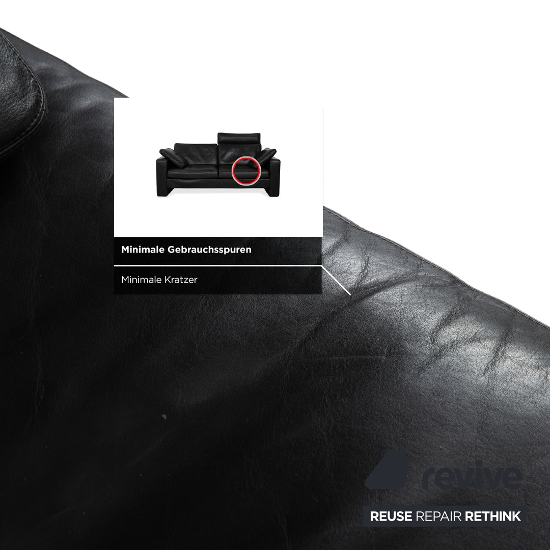 Canapé deux places en cuir noir Cor Conseta avec appui-tête