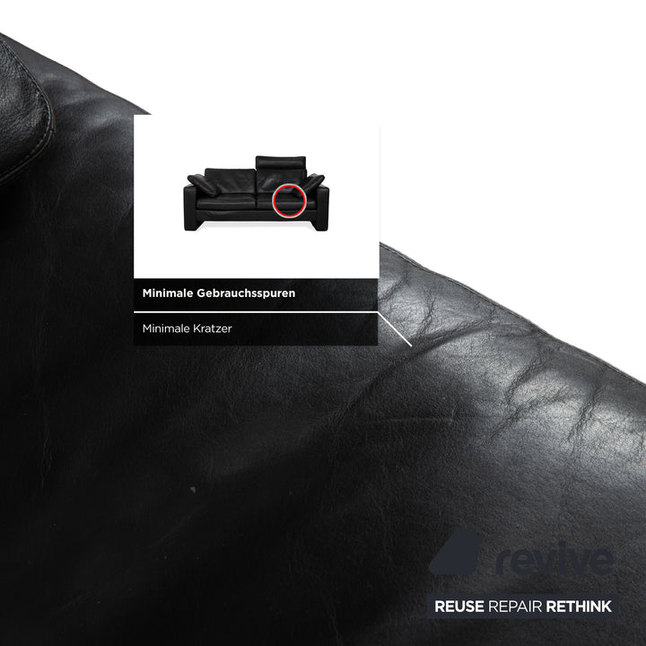 Canapé deux places en cuir noir Cor Conseta avec appui-tête