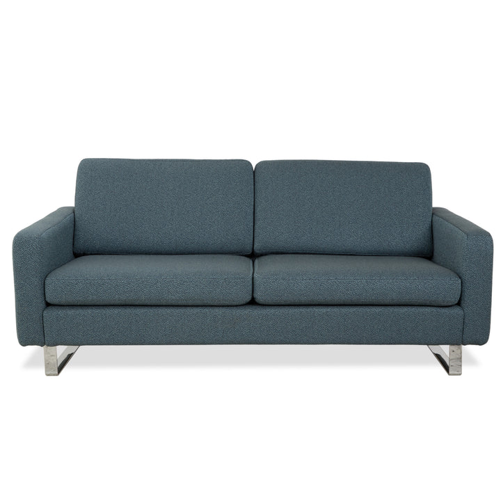 Réfection du canapé trois places COR Conseta en tissu bleu, vert, turquoise et gris