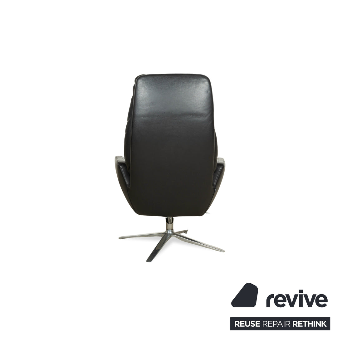 Fauteuil en cuir Cor Cordia noir à fonction manuelle avec tabouret