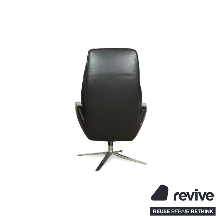 Fauteuil en cuir Cor Cordia noir à fonction manuelle avec tabouret