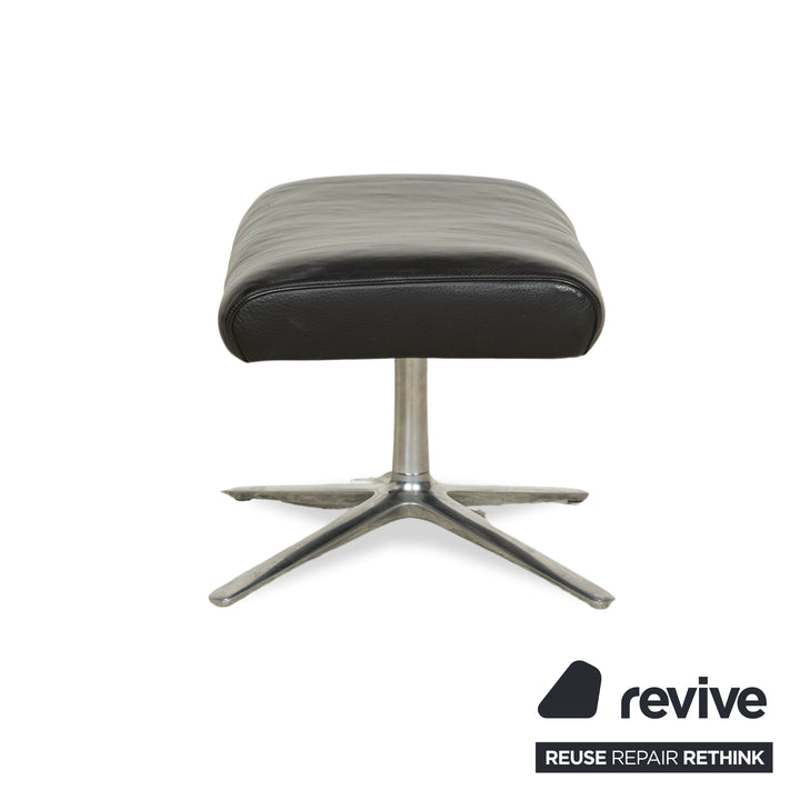 Fauteuil en cuir Cor Cordia noir à fonction manuelle avec tabouret