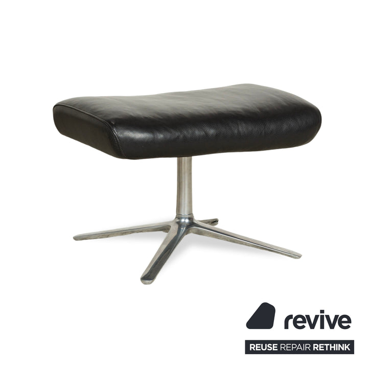 Fauteuil en cuir Cor Cordia noir à fonction manuelle avec tabouret